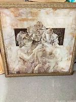 Full view of framed artwork showing subject and frame