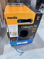 Front of Hyperline pull box with cable protruding