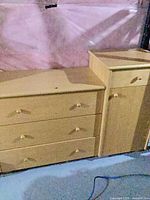 Full view of dresser with attached cabinet