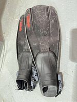 Full view of both fins showing overall design and wear