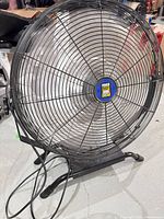 Full view of Power Fist 28-inch floor fan on stand