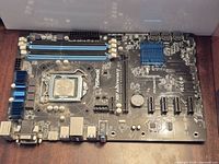 Full view of ASRock H97 Anniversary motherboard with CPU installed