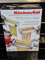 Retail box front showing KitchenAid KPRA pasta roller & cutter set