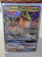 Front of Rayquaza GX card showing artwork, text, holographic finish