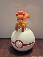 Front view assembled Vulpix on Poké Ball