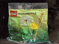 Front of sealed LEGO 30701 Field Flowers polybag showing graphics, piece count, age rating