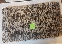 Stack of Alphabet Soup tissue paper sheets