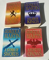 Front covers of all four novels laid out