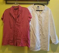 Front view of both garments on hangers