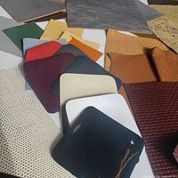 Group view of assorted leather pieces showing colors and textures