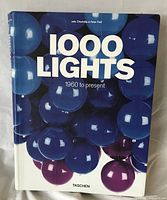 Front cover of 1000 Lights 1960 to Present hardcover book