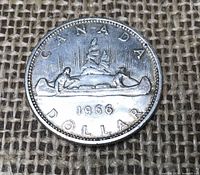 Reverse showing canoe design and 1966 date