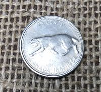Reverse of 1967 Canadian quarter with lynx design