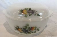 Casserole with lid showing fruit motif