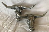 Front view of both bull head pulls showing design and finish