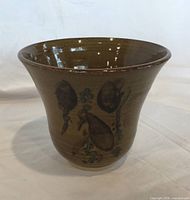 Front view of mustard glaze pottery vase