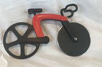 Full view of bicycle pizza cutter right side