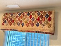 Full view of valance hung over window showing overall pattern and size