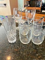 Group view of seven glasses on countertop showing various types
