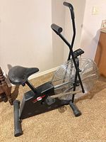 Full side view of Lifestyler fan resistance bike showing frame, seat, handlebars, fan wheel