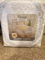 Front of packaged Classic Cameo king comforter showing design, size, material