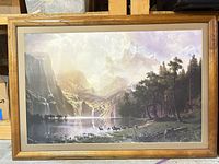 Framed print with misty mountains, waterfalls, lake, deer herd