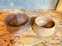 Both wooden bowls side by side showing contrasting wood tones and shapes