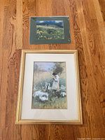 Overall view of both prints on floor, showing relative sizes and framing