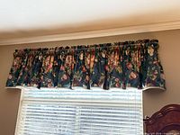 7 ft floral valance mounted above single window