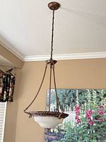 Full view of hanging chandelier showing overall design and drop length