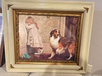 Girl with dog print in cream frame