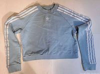 Front view Adidas light blue cropped sweatshirt