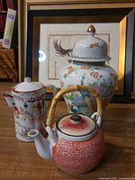 Group shot of ginger jar, chocolate pot and teapot