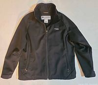 Front view of black Columbia Titanium softshell jacket