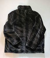 Front view of chevron faux fur coat