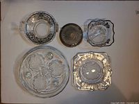 Overhead view of all five glass pieces and coaster