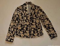 Front view of black and beige floral tailored jacket