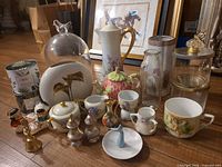 Full lot overview showing all porcelain, glass, candles and figurines