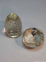 Both paperweights side by side