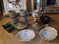 group shot of all nine pottery pieces