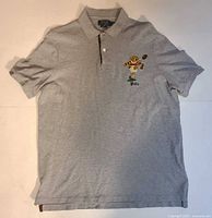 Front view of grey polo shirt with Polo Bear embroidery