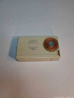 Front view showing brand name and tuning dial