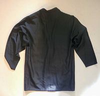 Back view of black silk jacket laid flat