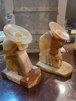 Front and side view of both onyx bookends