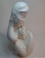 Front three-quarter view of porcelain sculpture