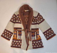 Front view of belted cardigan showing pattern and belt