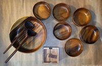 Full view of salad bowl set, servers, six small bowls, coaster set