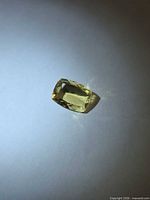 Rectangular cushion-cut golden yellow gemstone top view
