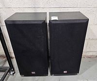 Front view of both Cerwin-Vega speakers with grills on