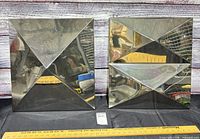 Both mirrored geometric panels front view with ruler for scale